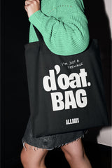 ALLDAYS d'oat. Tote bag in black 'I'm just a teenage d'oat bag'